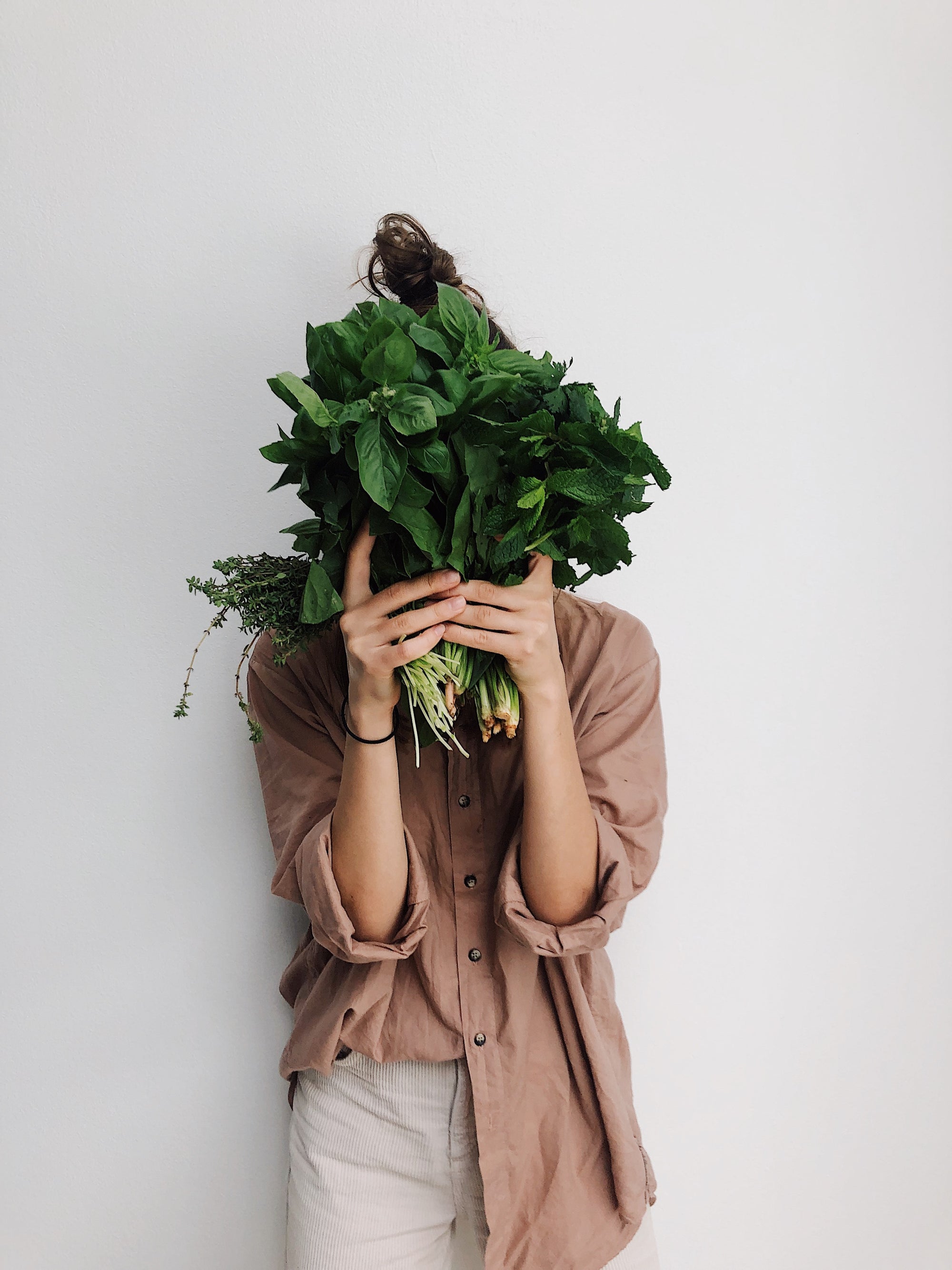 Woman holding lettuce