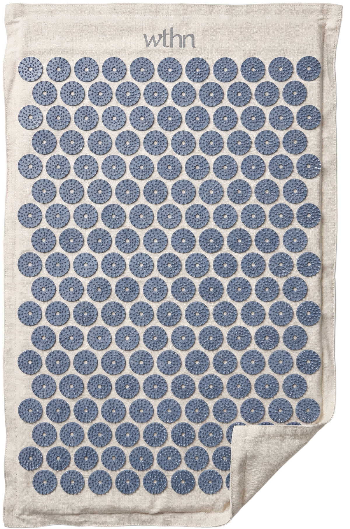 The WTHN acupressure mat: natural linen with rows of blue lotus stimulators